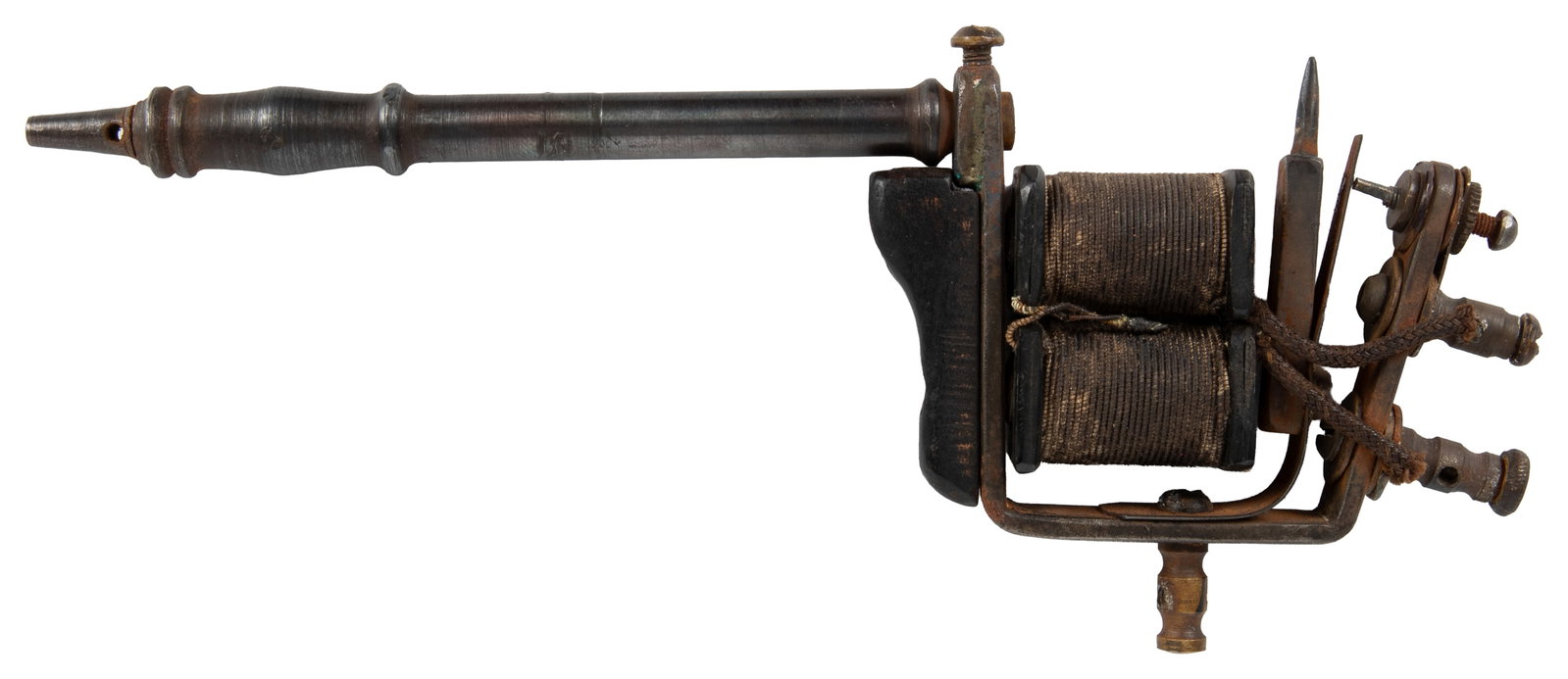 AW Gameges Pioneer Tattoo Machine. United Kingdom, early 20th century.: [TATTOO]. AW Gameges Pioneer Tattoo Machine. United Kingdom, early 20th century. Early electric tattoo machine with dual electromagnetic coils. Approx. 6 1/2 x 3 x 2". From the collection of tattoo ar