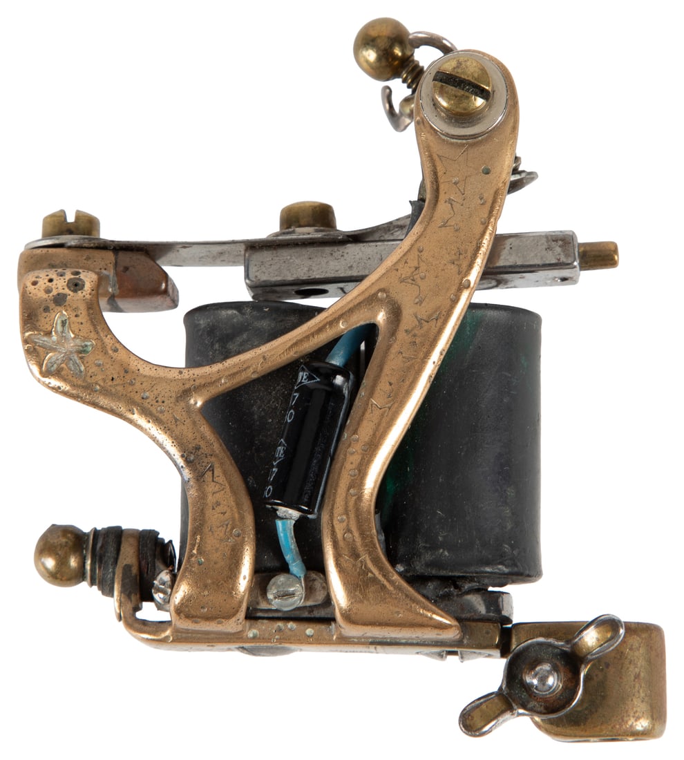 TUTTLE, Lyle (American, 1931-2019). Lyle Tuttle Custom-Built Etched Brass Tattoo Machine. [San (1 of 3)