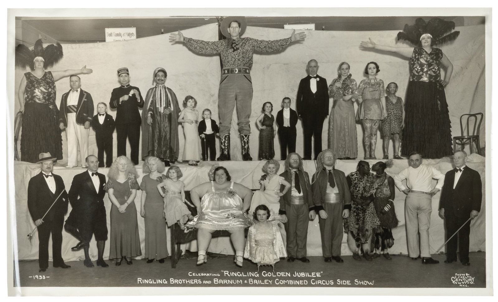KELTY, Edward J. (1888 - 1967). Ringling Bros. and Barnum & Bailey Combined Circus Side Show. 1933.: KELTY, Edward J. (1888 - 1967). Ringling Bros. and Barnum & Bailey Combined Circus Side Show. 1933. New York: Century. Silver print panoramic photograph of the circus side show cast of 1933, celebrati