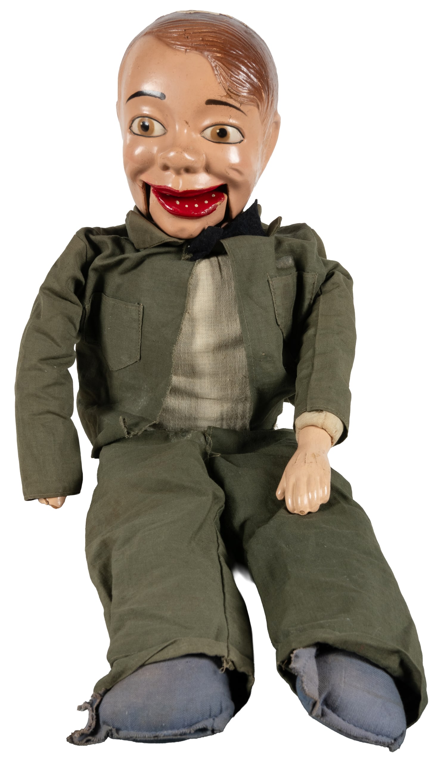 Jerry Mahoney-Style Ventriloquist Doll. Circa mid-20th century.: Jerry Mahoney-Style Ventriloquist Doll. Circa mid-20th century. Composition head doll with movable mouth, painted features, and green outfit. String at back to manipulate mouth. Length: 26".