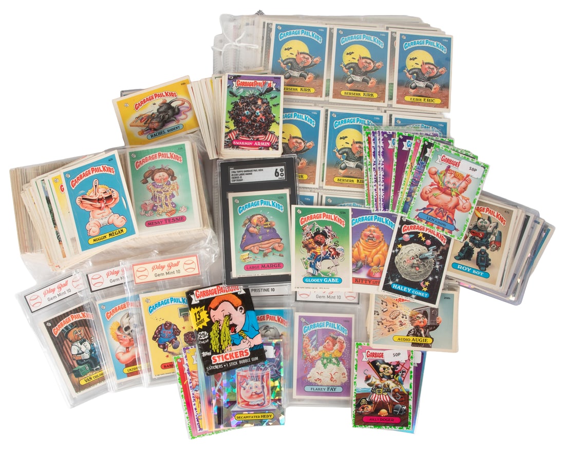 Collection of Garbage Pail Kids trading cards.: Collection of Garbage Pail Kids trading cards. A large group of several hundred cards, many from 1986 sets, and others from 2020 and 2022 sets. Includes a 13th Series wax pack, an SGC graded 1986