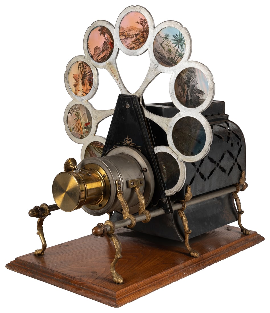 [MAGIC LANTERN]. Pettibone New Improved Sciopticon.: [MAGIC LANTERN]. Pettibone New Improved Sciopticon. Cincinnati: Pettibone Mfg. Co., ca. 1880s. A "Champion" model magic lantern with stenciled 1888 patent date. Affixed to wooden base with original