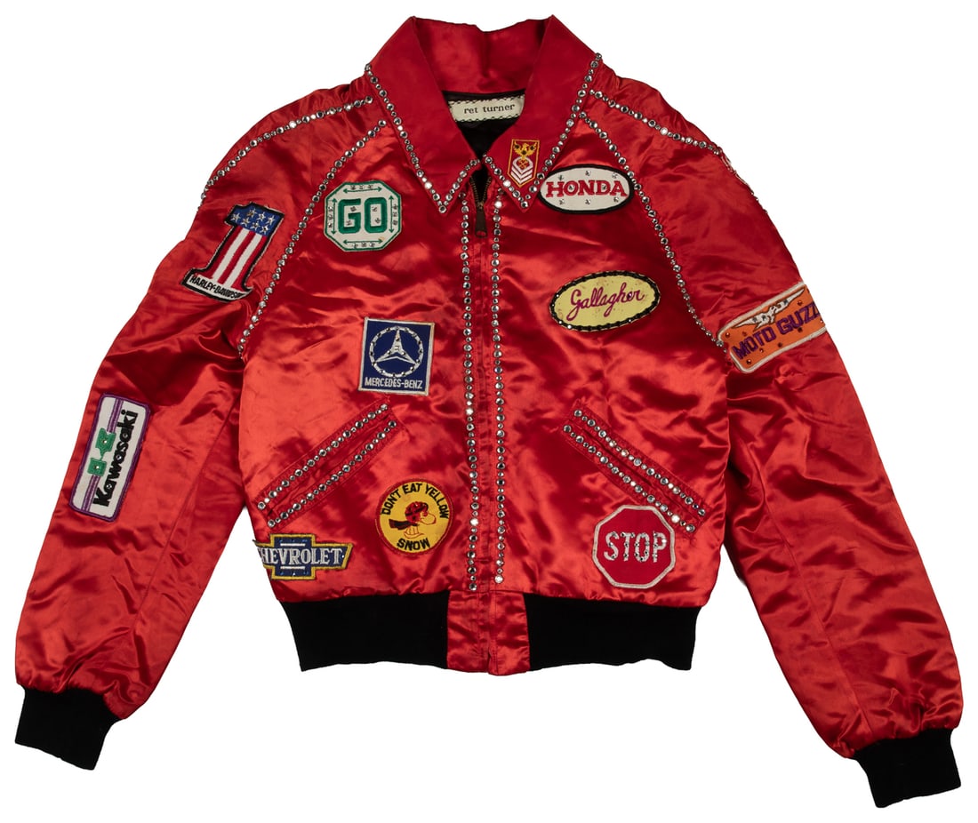GALLAGHER (Leo Gallagher Jr., 1946 - 2022). "Park It" Decorated Satin Bomber Jacket. Late 20th: GALLAGHER (Leo Gallagher Jr., 1946 - 2022). "Park It" Decorated Satin Bomber Jacket. Late 20th century. Vintage Ret Turner brand red satin racing-style bomber jacket, embellished with various