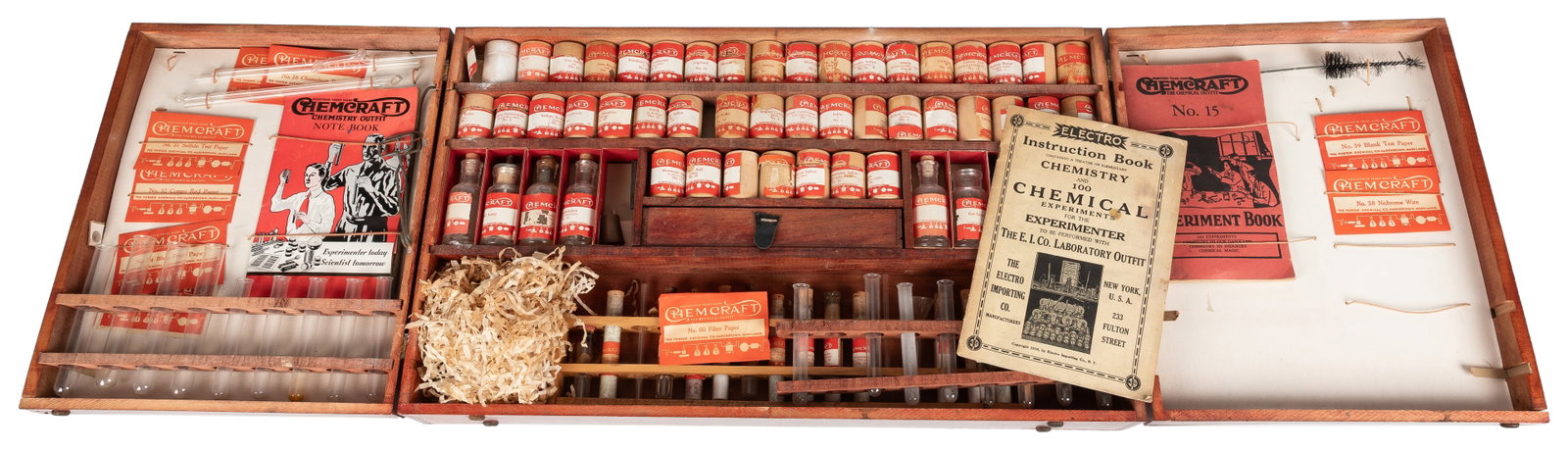 Chemcraft Chemistry Outfit No. 15.: Chemcraft Chemistry Outfit No. 15. Circa 1920s-30s. Large chemistry set in clasping wooden case including labeled canisters, test papers, glass tubes and vials, and booklets. 13 3/4 x 23 1/4 x 3 1/2"