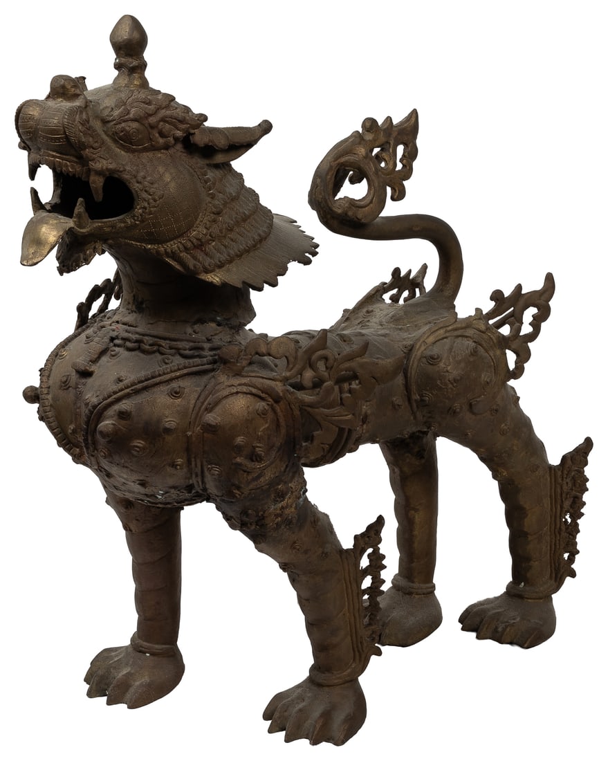 Large cast brass guardian lion or Snow Lion figure. (1 of 3)