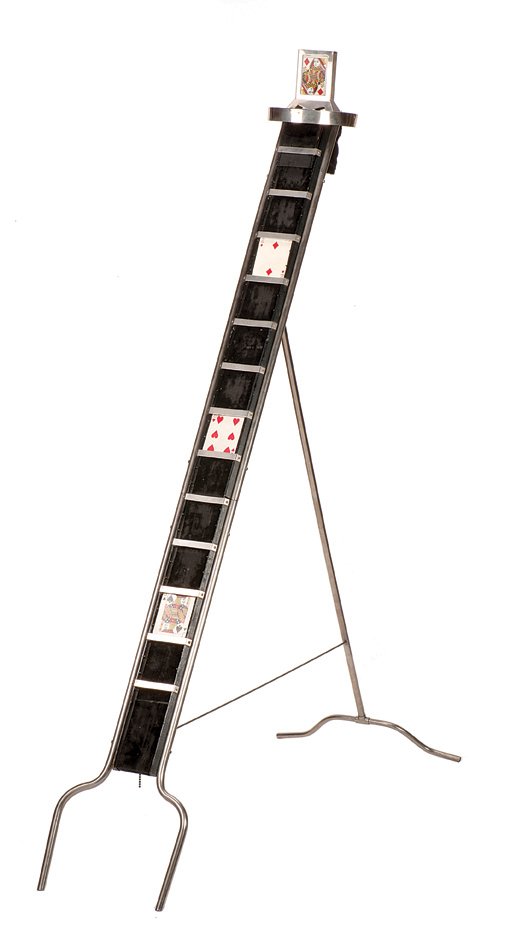 31. Card Ladder. New Haven, Petrie & Lewis, ca. 1924.: 31. Card Ladder. New Haven, Petrie & Lewis, ca. 1924. Three cards are selected from the pack, which is placed in a nickeled Houlette at the top of the ladder. The cards then cascade down the ladder, f