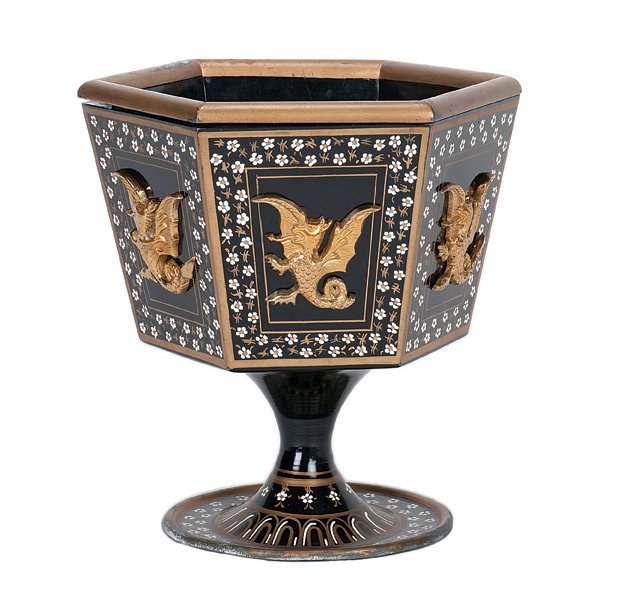 40. Chalice trick. Portugal, Magiarte, ca. 1966.: 40. Chalice trick. Portugal, Magiarte, ca. 1966. Liquid and confetti poured into this large chalice is transformed in to dry silks. Hexagonal and painted metal chalice with cast dragons on its exterio