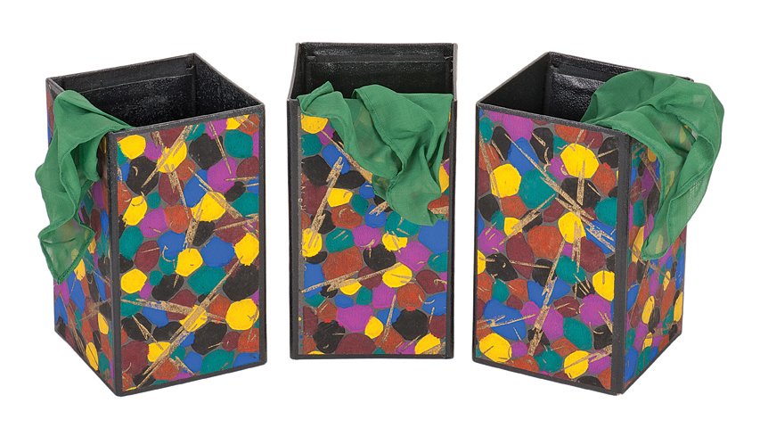44. Three Chinese Cubes. Portugal, Magiarte, ca. 1966.: 44. Three Chinese Cubes. Portugal, Magiarte, ca. 1966. A silk handkerchief vanishes from the magicians hand, reappears in a tube, then transposes between three tubes, finally appearing tucked into the
