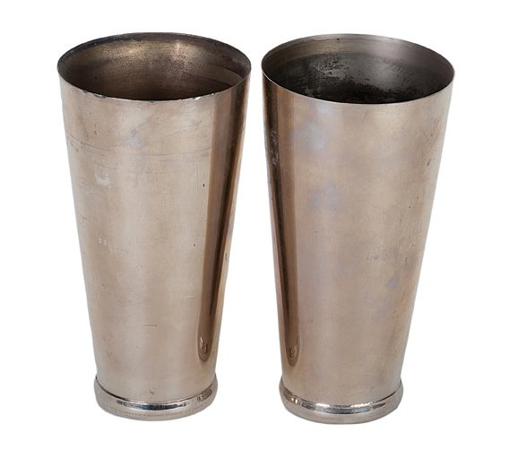 49. Improved Cocktail Shakers. Loyd, ca. 1945.: 49. Improved Cocktail Shakers. Glendale California, Loyd, ca. 1945. The magician produces virtually any drink named by his audience from two empty chromed cocktail shakers. Shakers stand 7 ½” high.