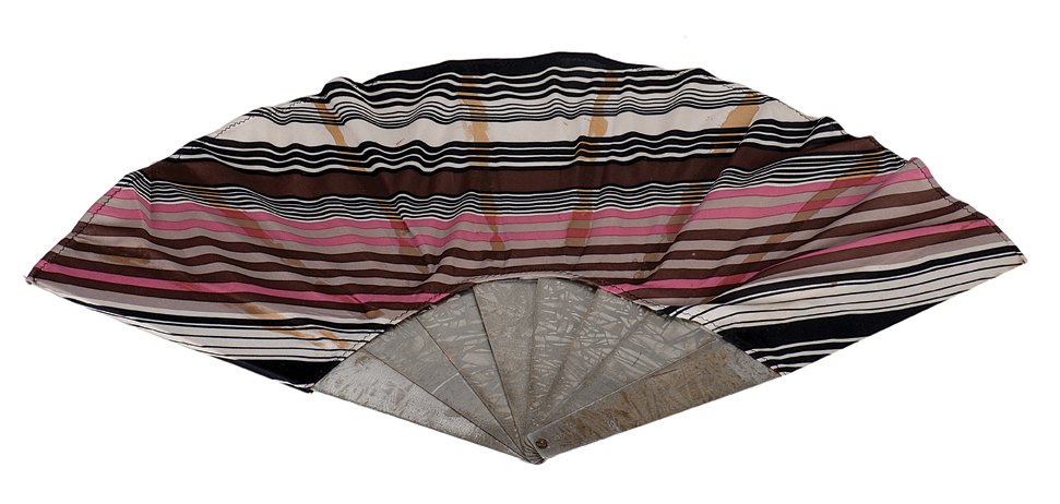 85. Fan of Nations. P & L, ca. 1930.: 85. Fan of Nations. New Haven Connecticut, Petrie & Lewis, ca. 1930. An unusual version of the Mutilated Parasol. The covering of a fan and small silk flags transpose. Fan 16” long. With instruction