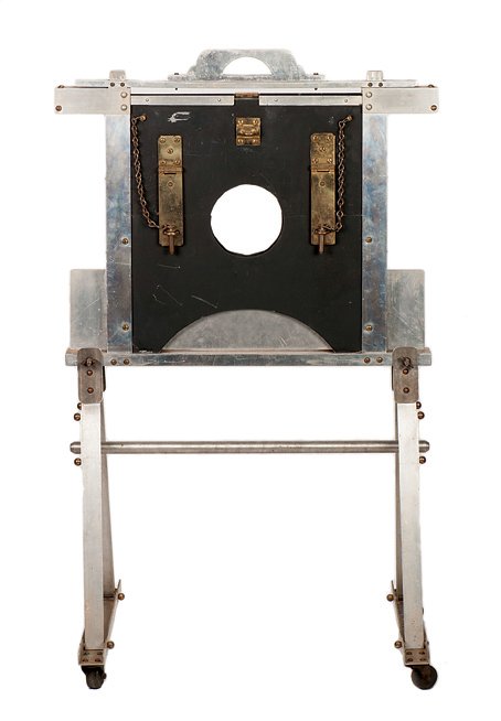 110. Head Chopper. Bridgeport, Sherms Inc., ca. 1945.: 110. Head Chopper. Bridgeport, Sherms Inc., ca. 1945. A spectator’s head goes unharmed by this guillotine; the blade passes through his neck, even though it cuts through objects in the space below i