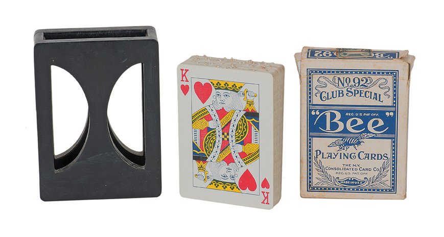 145. Neyhart Houlette. A.P. Neyhart, ca. 1940.: 145. Neyhart Houlette. Los Angeles, A.P. Neyhart, ca. 1940. Mechanical bakelite card houlette and delicate custom manufactured deck of Bee-back playing cards. Very good condition, with wear to gimmick