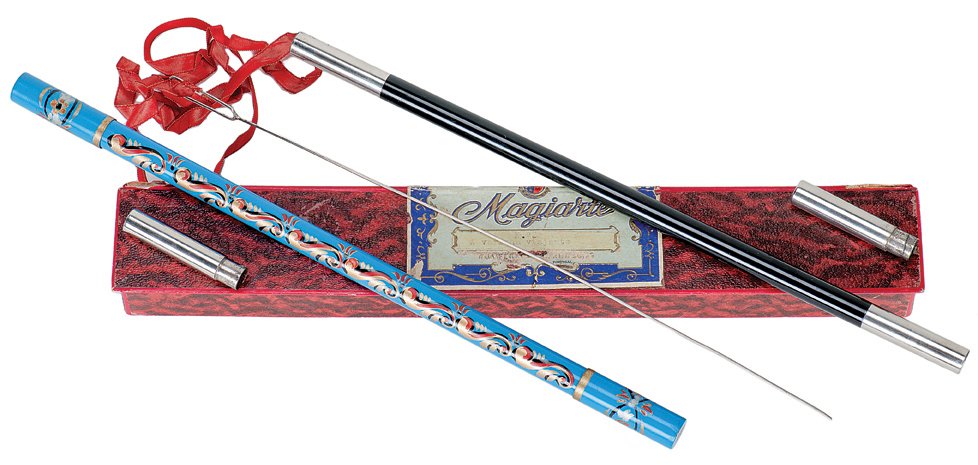 223. Vanishing Wand. Portugal, Magiarte, ca. 1960.: 223. Vanishing Wand. Portugal, Magiarte, ca. 1960. A wand is placed into a hand-painted metal tube. The caps of the tube are removed and the wand has vanished. A ribbon can be pulled through the tube