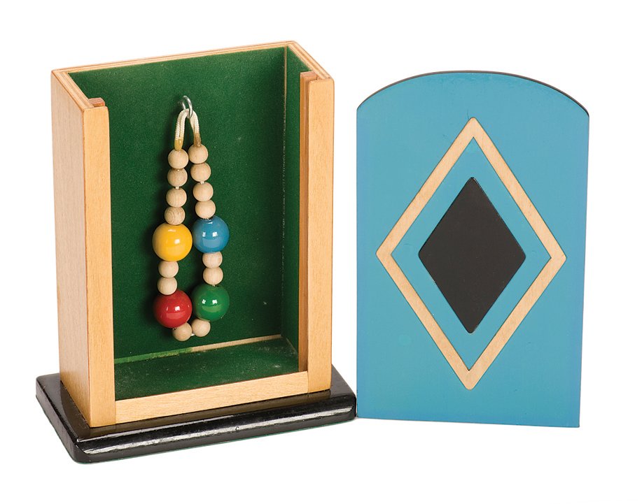236. The Magic Beads. Cornwall, Alan Warner, ca. 2003.: 236. The Magic Beads. Cornwall, Alan Warner, ca. 2003. A beaded necklace vanishes and reappears hanging on a hook inside a box shown empty only moments before. Box 5 x 2 ¼ x 7”. With instructions. 