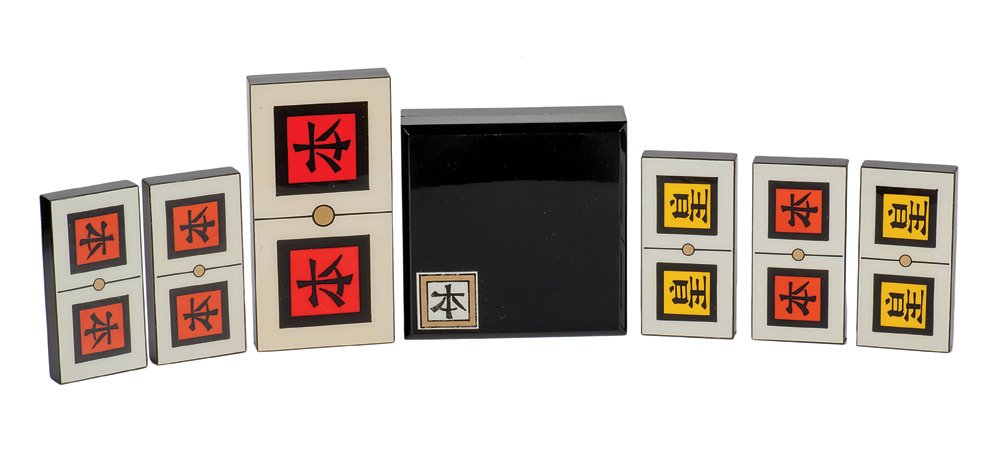 334. Dizzy Domino set (Chinese). Taytelbaum.: 334. Dizzy Domino set (Chinese). Holland, Eddy Taytelbaum, ca. 1970. Five handmade reverse-painted plastic laminate dominos bearing an Asian symbol; two in orange, two in yellow, and one gimmicked. Do