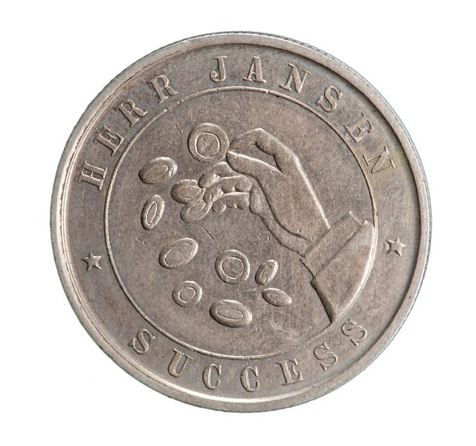 Jansen, Harry. Herr Jansen (Dante) advertising token.: Jansen, Harry. Herr Jansen (Dante) advertising token. New York, 1908. Jansen went on to fame as the globe trotting illusionist, Dante. This token advertises him as a “coin expert.” Germain silver.