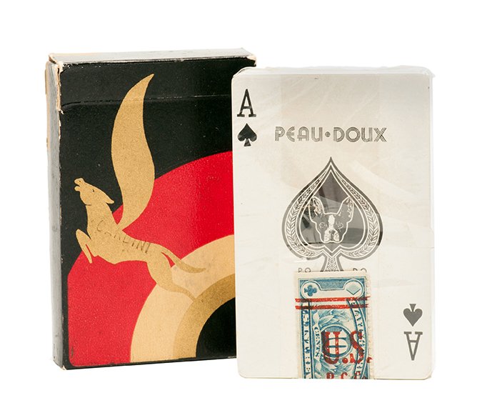 Cardini’s gold Peau Doux playing cards.: Cardini. Cardini’s gold Peau Doux playing cards. Chicago, Walgreen Co., ca. 1934. Unopened pack of the bridge-size fanning cards purchased by Cardini for use in his famous act. Stamped “CARDINI.��
