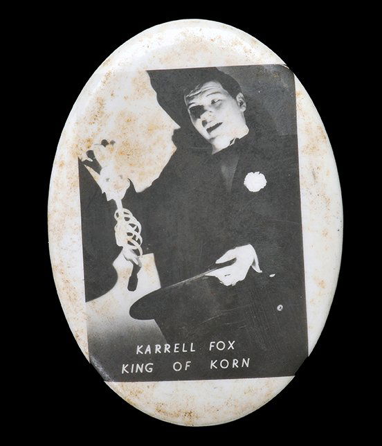 Fox, Karrell. Karrell Fox mirror card.: Fox, Karrell. Karrell Fox mirror card. American, 1940s. Celluloid pocket mirror bearing a ½ length portrait of a young Fox. Obverse and mirror tarnished. Oval, 56 x 80mm. Owned by Karrell Fox. PM19.