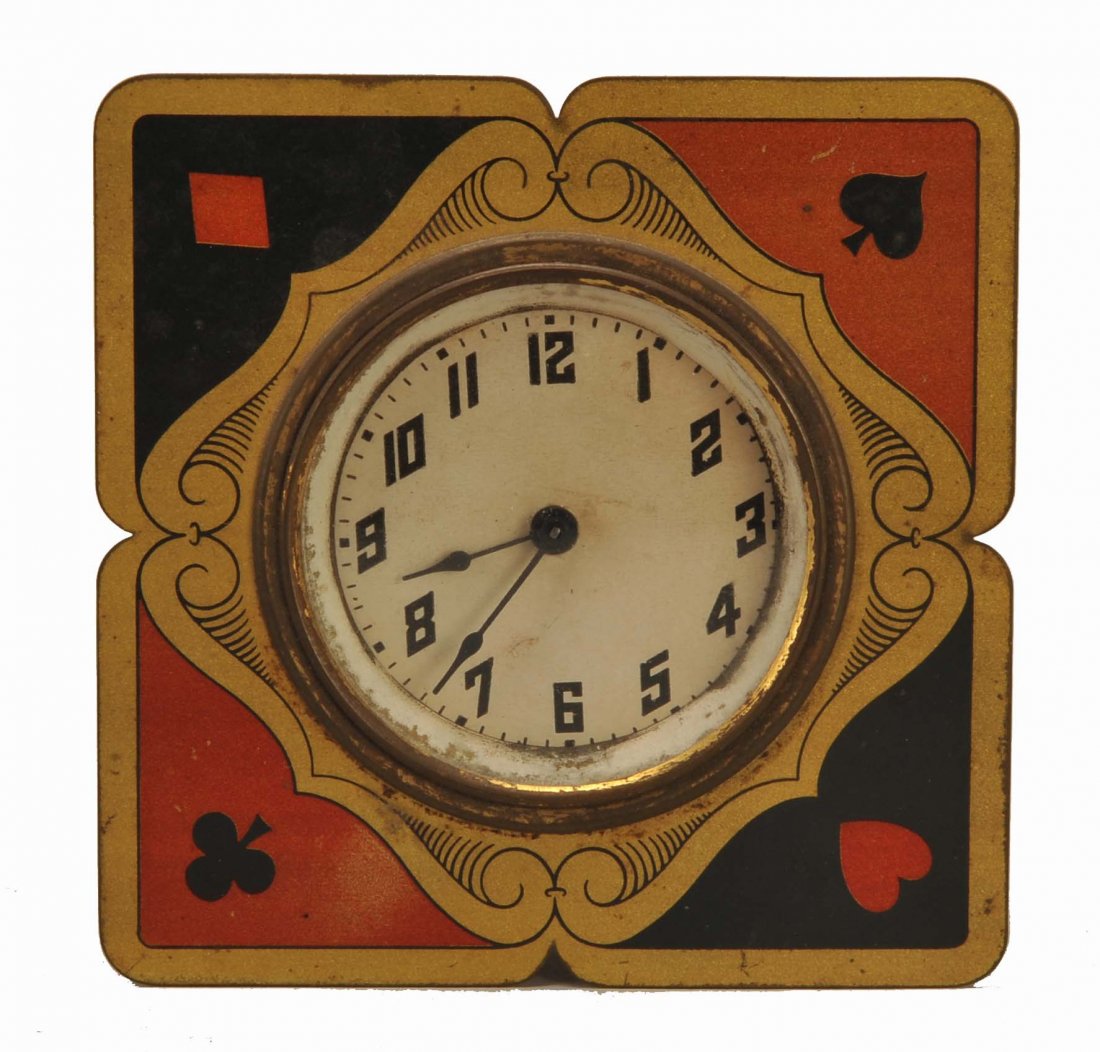 Art Deco Clock with Playing Cards. Maker unknown, ca.: Art Deco Clock with Playing Cards. Maker unknown, ca. 1930. Clock set into enameled brass plate with suit symbols in corners. Brass stand at rear. 3 ½”.