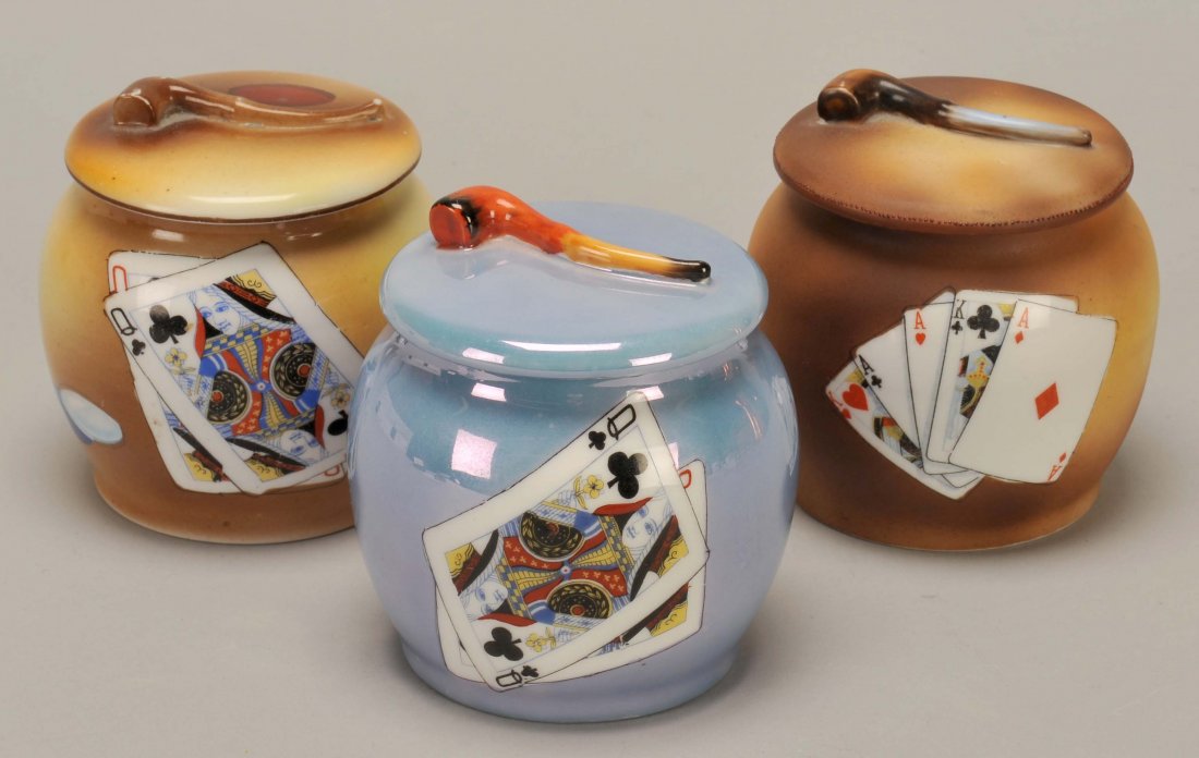 Three Nippon Hand Painted Porcelain Tobacco Jars with: Three Nippon Hand Painted Porcelain Tobacco Jars with Playing Cards & Pipe on Lid. Noritake, ca. 1915, 3 ½”, Exc.