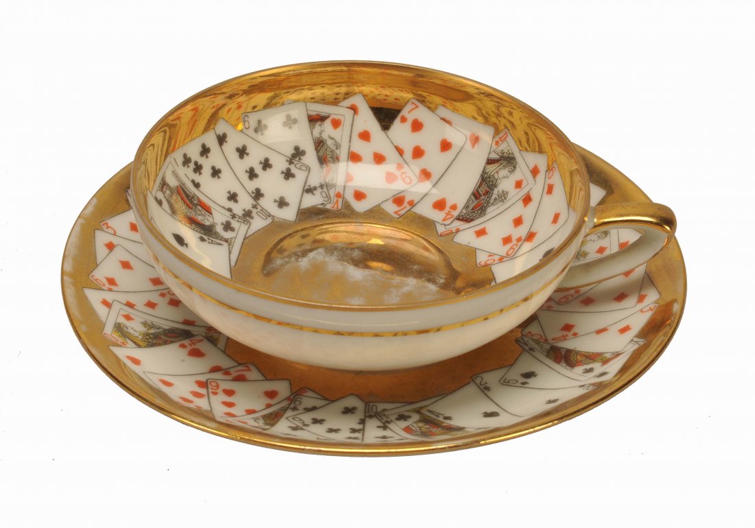Fine Limoge Porcelain Cup & Saucer. Bernardaud & Co. (B: Fine Limoge Porcelain Cup & Saucer. Bernardaud & Co. (B & Co), Limoge, France, ca. 1920. Delicate cup and saucer in gold with enameled playing cards around inside rim of cup and outside rim of saucer.
