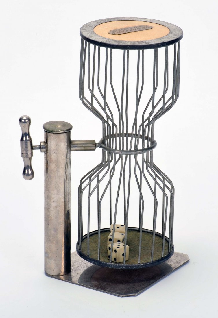 Chuck-a-Luck Cage. Cage with three dice and brass tag: Chuck-a-Luck Cage. Cage with three dice and brass tag from the Goldfield Hotel, Nevada. 11 ¼”, VG.