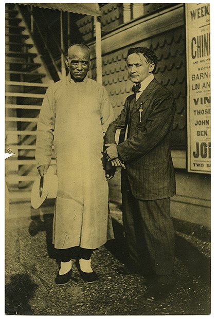 Portrait of Houdini and Ching Ling Foo, ca. 1910.: Houdini, Harry. Full-length portrait of Houdini and Ching Ling Foo. [New York], ca. 1910. Houdini and the great Chinese magician stand outside the Brighton Beach theatre, where Foo was appearing. 6 ¼