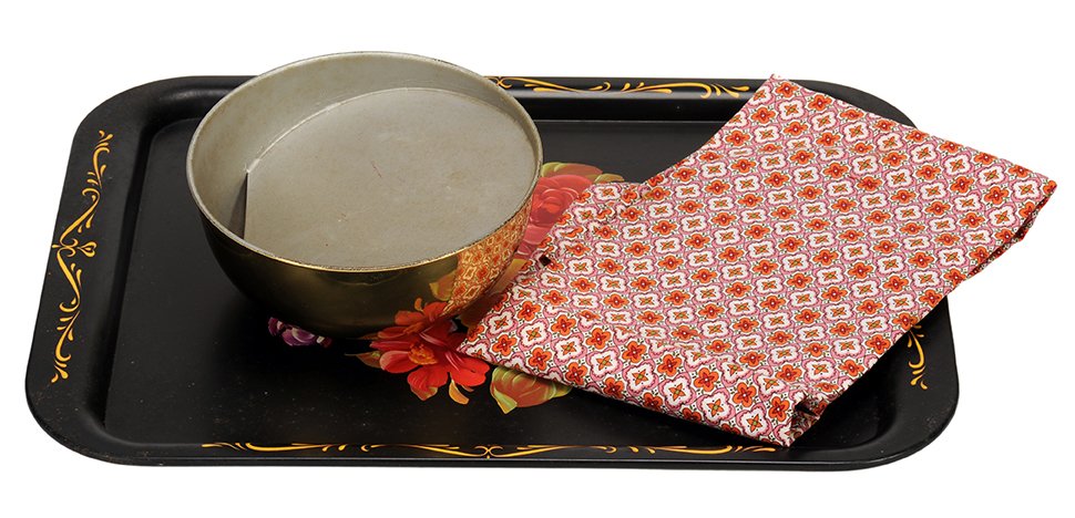 Vanishing Bowl of Water. New Haven, Petrie & Lewis.: Vanishing Bowl of Water. New Haven, Petrie & Lewis, ca. 1950. A brass bowl resting on a painted tray is filled with water. The bowl is covered and lifted from the tray. When tossed into the air, the b