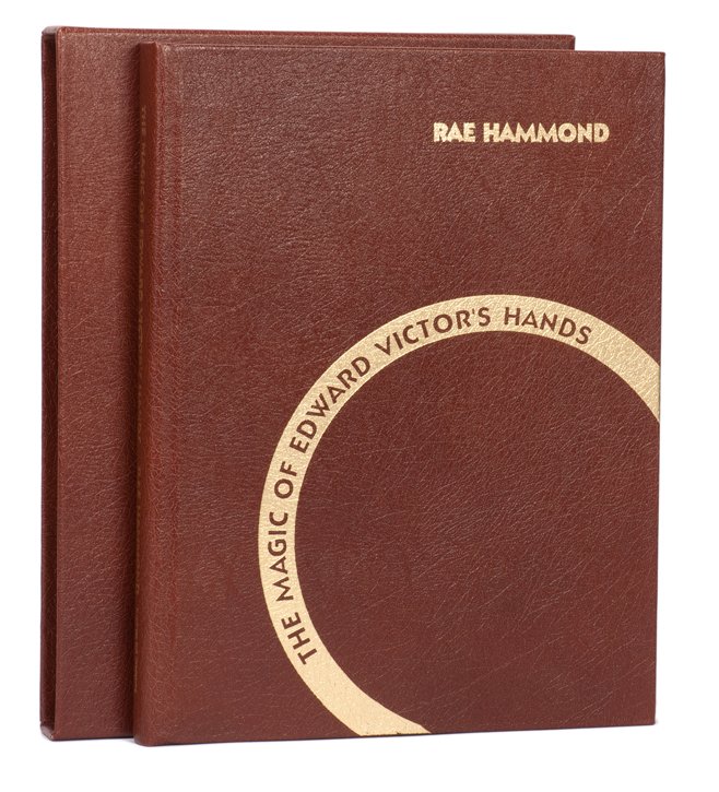 Hammond, Rae. The Magic of Edward Victor’s Hands.: Hammond, Rae. The Magic of Edward Victor’s Hands. [Washington, D.C.]: Kaufman and Greenberg, 1995. First Edition. Brown leather stamped in gold, in a matching slipcase. One of the signed copies from