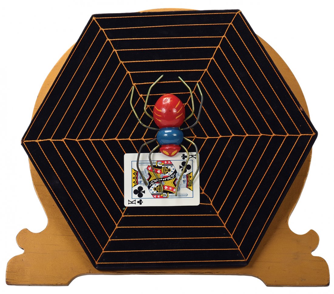 Card Spider. Los Angeles, F.G. Thayer, ca. 1935.: Card Spider. Los Angeles, F.G. Thayer, ca. 1935. A selected card visibly appears in the legs of the spider when its web is spun. Spider with turned wooden body, hand painted. 14 x 14”. Very good.