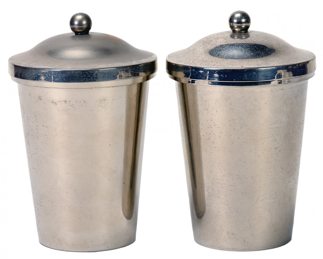 Coffee and Milk Trick. New Haven, Mysto Magic.: Coffee and Milk Trick. New Haven, Mysto Magic, ca. 1910. The magician scoops bran or confetti into two nickel-plated cups and clamps lids on them. Moments later, one is full of hot coffee and the othe