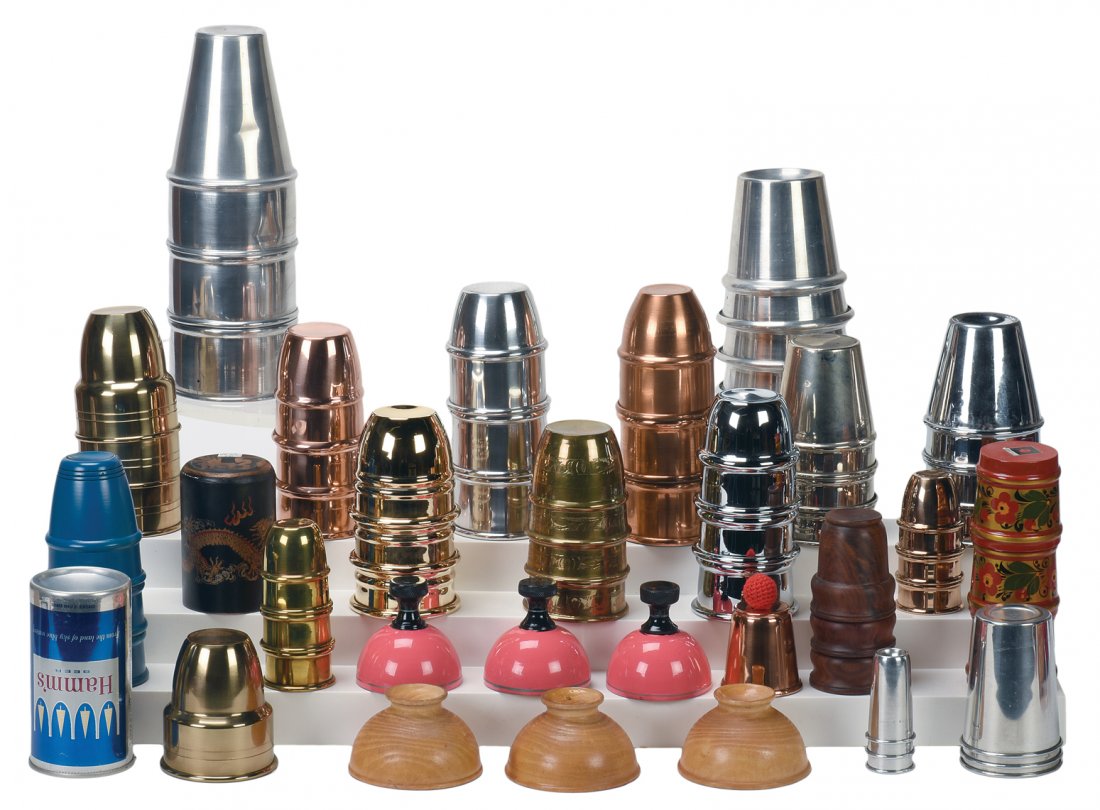 [Cups and Balls] Collection of 30 sets of Cups and: [Cups and Balls] Collection of 30 sets of Cups and Balls and Chop Cups. Including sets manufactured by Golden Gate Magic (hallmarked), Morrissey (combo cup set in copper), Fantasma (Buddha Chop Cup), 