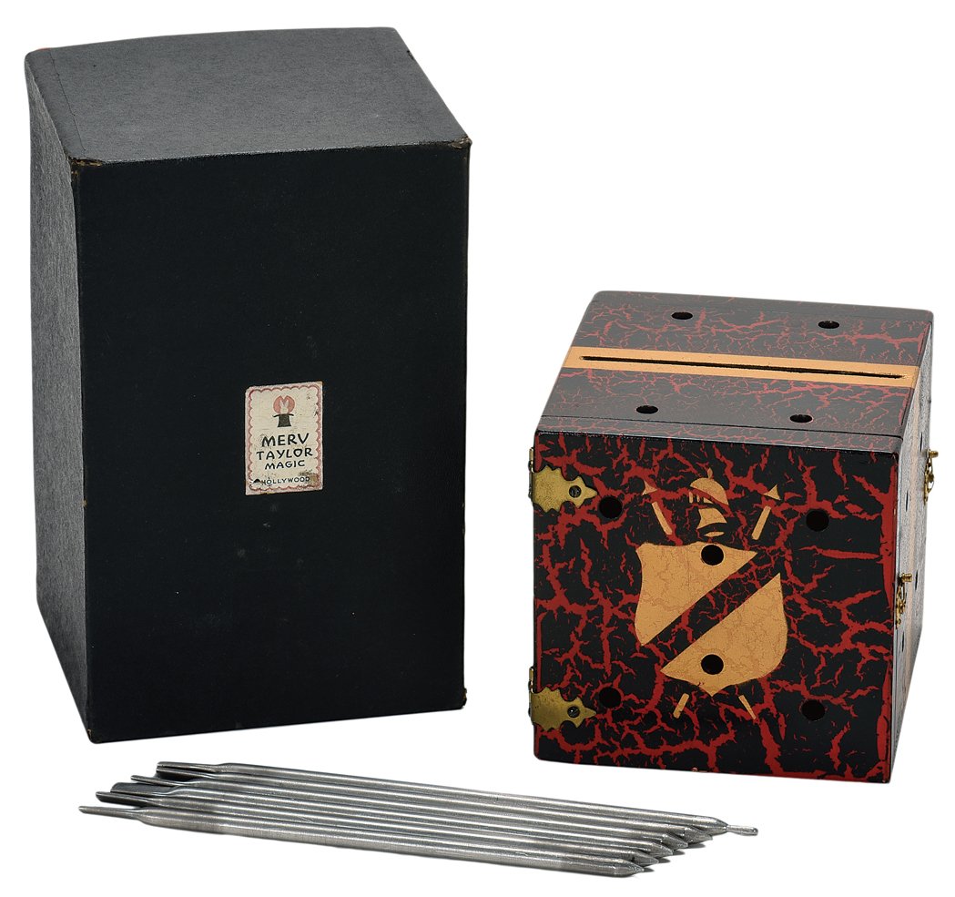 Leon’s Improved Glass Penetration. Merv Taylor.: Leon’s Improved Glass Penetration. North Hollywood, Merv Taylor, ca. 1955. A sheet of glass is placed in a wooden box. The box (and glass, apparently) is then perforated by metal spikes, yet the gla