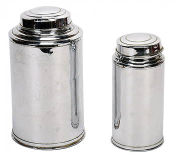 Sand Canisters. New Haven, P&L, ca. 1935.: Sand Canisters. New Haven, P&L, ca. 1935. A small metal canister fills a larger canister with sand repeatedly – the quantity of sand produced and received seems virtually endless. Large canister 10