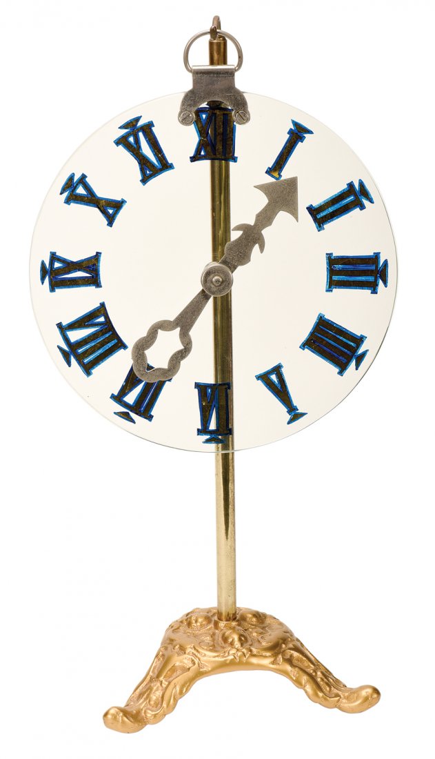 Spirit Clock Dial. American [?], ca. 1930.: Spirit Clock Dial. American [?], ca. 1930. Any number on the dial is named. The hand is spun and stops on the named number. Glass dial 10” diameter, stand 20” high. Expertly refinished. Very good.