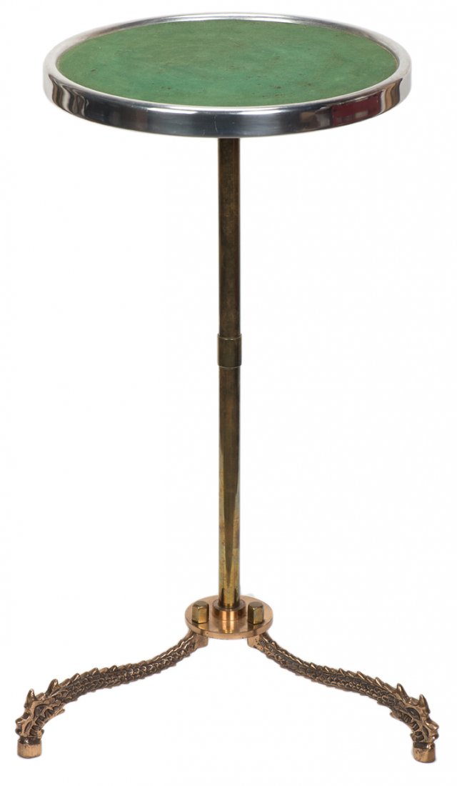 Dragon Table. New Haven, Petrie & Lewis, ca. 1935.: Dragon Table. New Haven, Petrie & Lewis (P&L), ca. 1935. Portable magician’s table with legs in the shape of dragons. Bronze finish. With uncommon P&L-issued round metal top. 29” high. Very good.