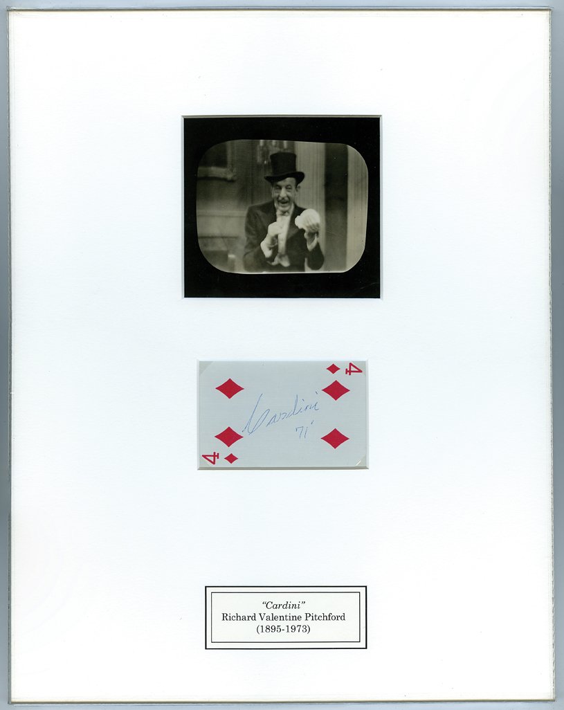 Framed playing card signed by Cardini. W/Desfor photo.: Cardini. Playing card signed by Cardini. Archivally matted together with an Irving Desfor photograph of a television screen on which Cardini is performing with cards on the famous NBC Festival of Magi