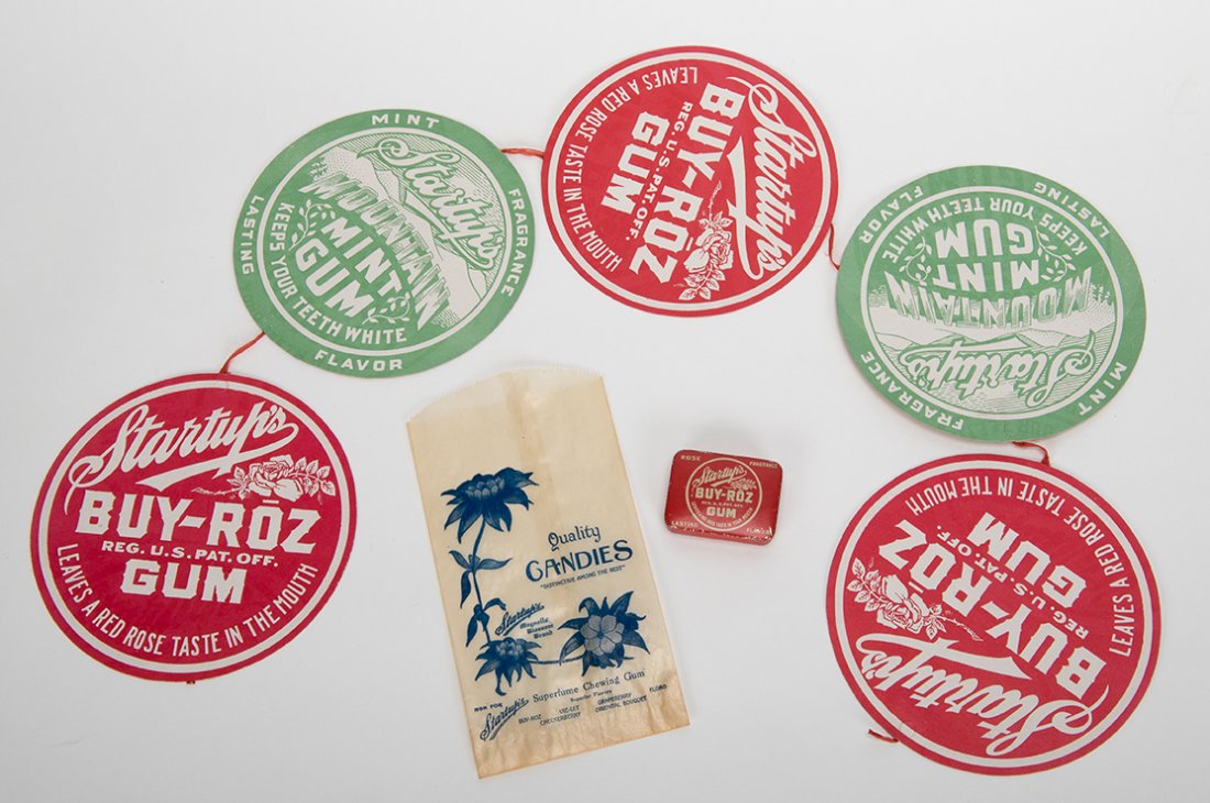 529. Three Startup’s Gum Items. Including a ca. 1920: 529. Three Startup’s Gum Items. Including a ca. 1920 Buy-Roz & Mountain Mint Gum five-piece cardboard store hanger; a Buy-Roz Gum tin; and a glassine bag for Superfume Chewing Gum. Very good to exce