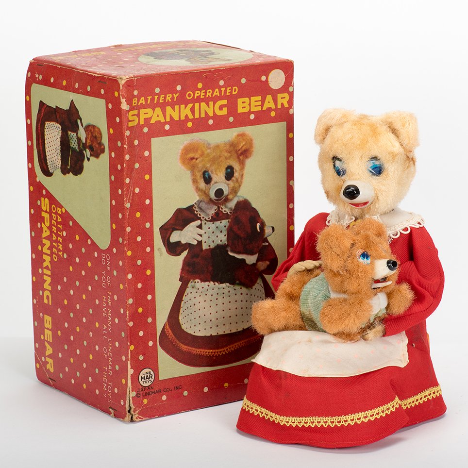 824. Spanking Bear Toy. Japan, Linemar, 1950s. Battery: 824. Spanking Bear Toy. Japan, Linemar, 1950s. Battery operated toy. Lithographed tin and fabric. With original box (worn). 9 ¼” high. Very good. Working.