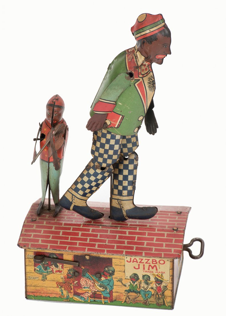 884. Jazz Bo Jim Toy. New York, Unique Art, ca. 1920.: 884. Jazz Bo Jim Toy. New York, Unique Art, ca. 1920. Lithographed tin wind-up toy. 9” high. Finish lightly worn; good. Working.