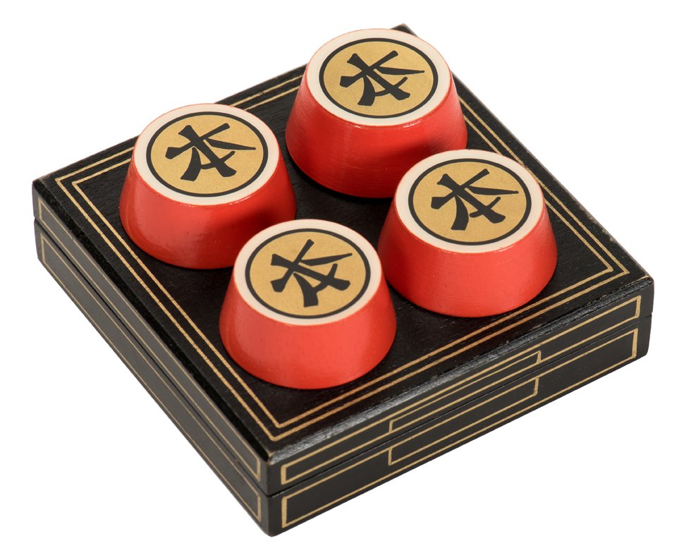 Chinka Chink. Holland, Eddy Taytelbaum, ca. 1970. Four: Chinka Chink. Holland, Eddy Taytelbaum, ca. 1970. Four turned wooden blocks magically transpose positions. Shell made of balsa wood. With hand-painted wooden carrying case. Fine.