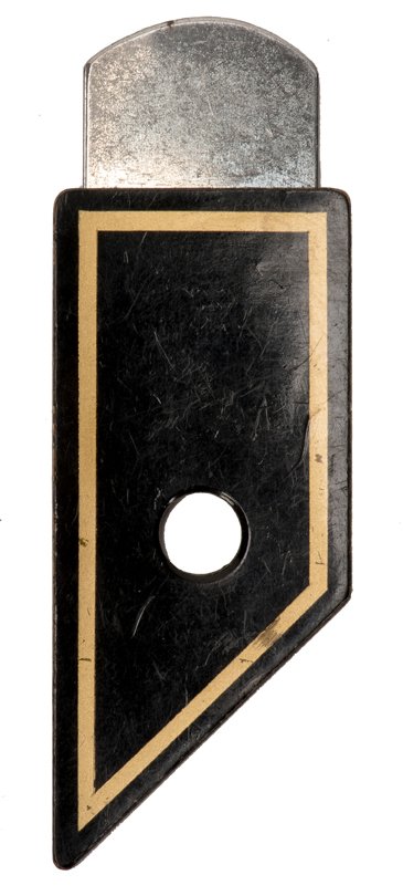 Cigarette Cutter. Holland, Eddy Taytelbaum, ca. 1970.: Cigarette Cutter. Holland, Eddy Taytelbaum, ca. 1970. Miniature guillotine-like prop. A cigarette placed in a hole remains unharmed when a blade is run through it. 3 ” long. Minor paint wear.