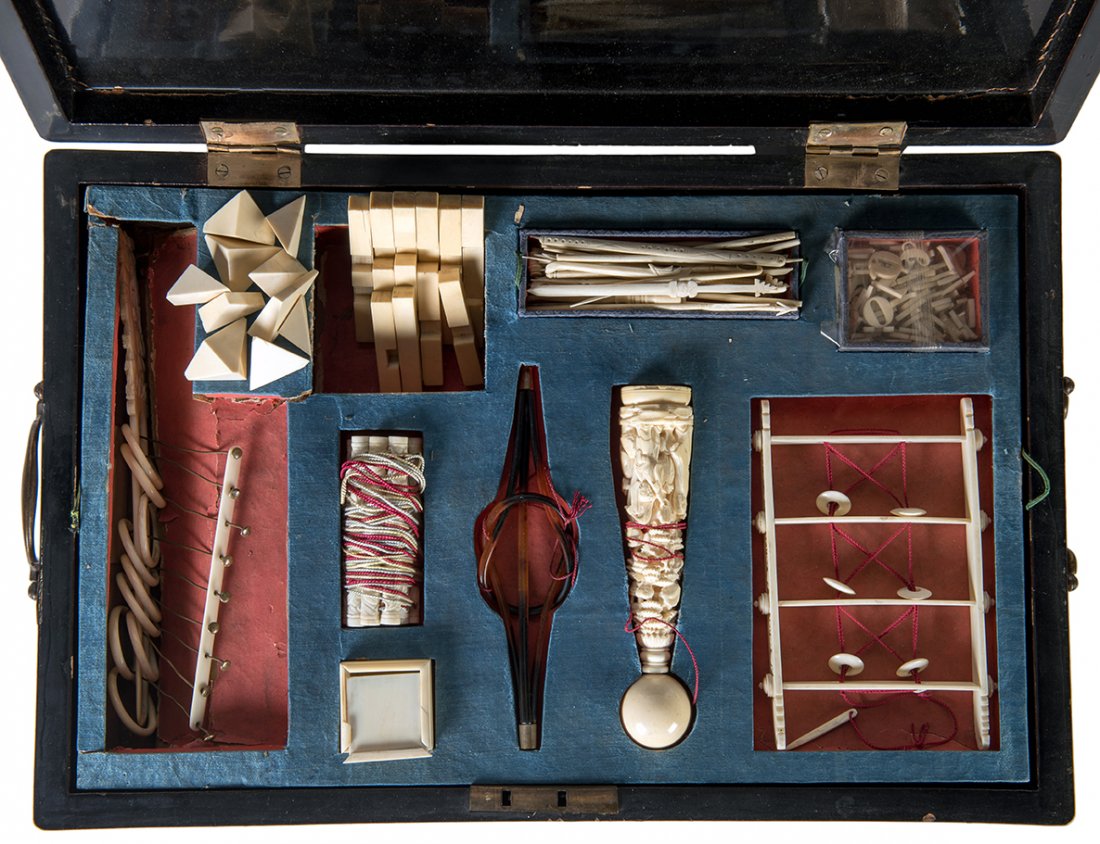 Chinese Ivory Puzzle Set. Circa 1880. Approximately 17: Chinese Ivory Puzzle Set. Circa 1880. Approximately 17 different intricate puzzles handcrafted from ivory (or bone?) in a fitted and locking wooden case. Included are Pyramid and shape puzzles, string