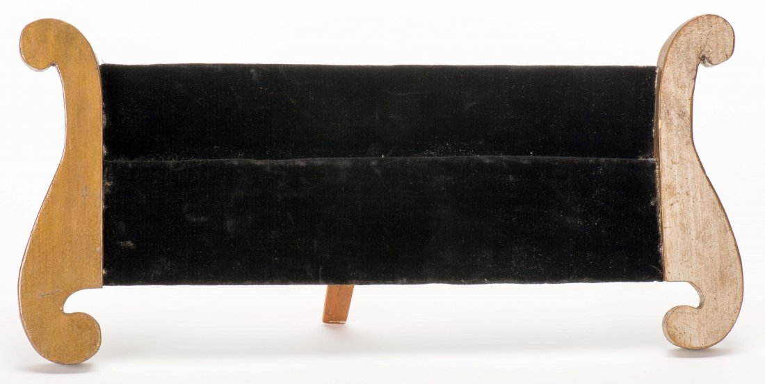 Coin Easel. Los Angeles: F.G. Thayer [?], ca. 1920. A: Coin Easel. Los Angeles: F.G. Thayer [?], ca. 1920. A lyre-type easel that allows the magician to vanish four coins without sleight-of-hand. 9 ¾" high. Good. Scarce.