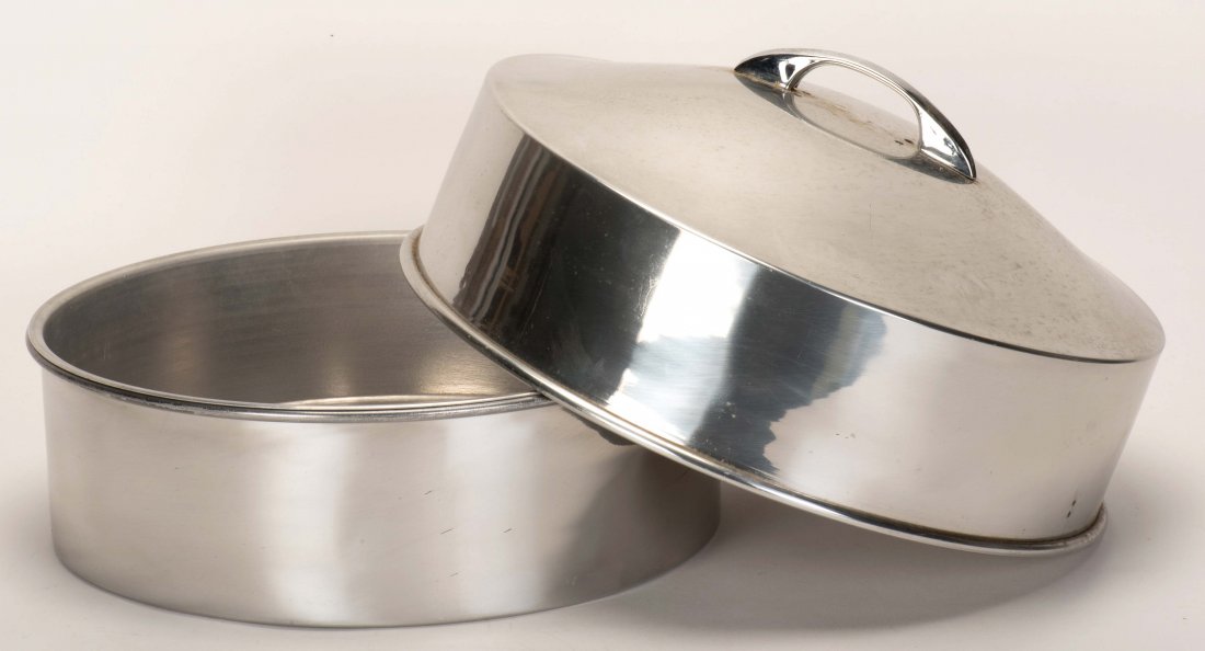 Duck Pan. New Haven: Petrie & Lewis (P&L), ca. 1950.: Duck Pan. New Haven: Petrie & Lewis (P&L), ca. 1950. Empty metal pan (approx. 12 ¾ x 6") produces a massive quantity of articles, or even a live duck. Hallmarked. Minor surface wear; very good.