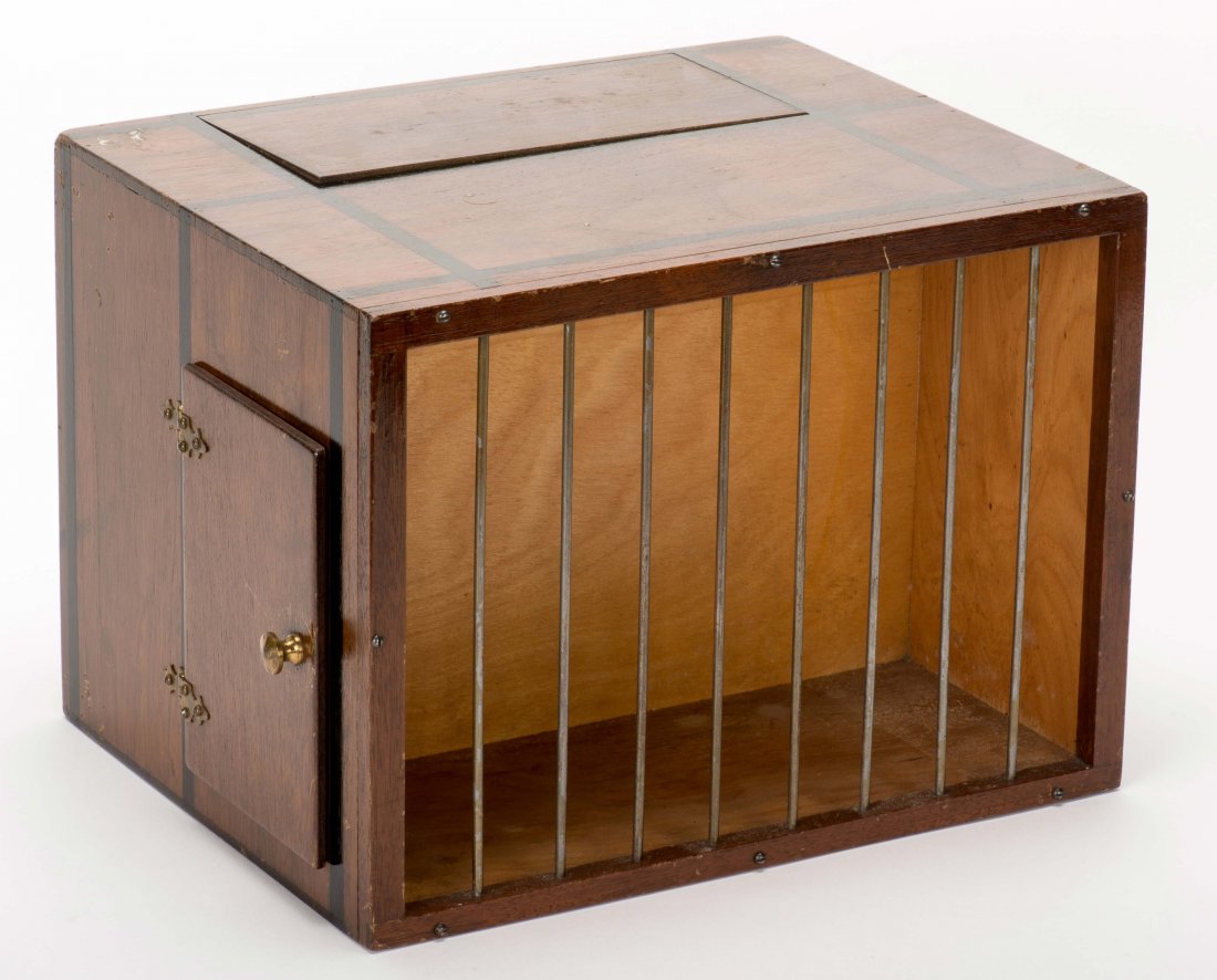Guinea Pig Box. Glendale: Loyd, ca. 1950. Painted: Guinea Pig Box. Glendale: Loyd, ca. 1950. Painted hardwood cage with steel bars holds a live guinea pig. The magician removes the animal from the cage and tears it to pieces, but thanks to the special