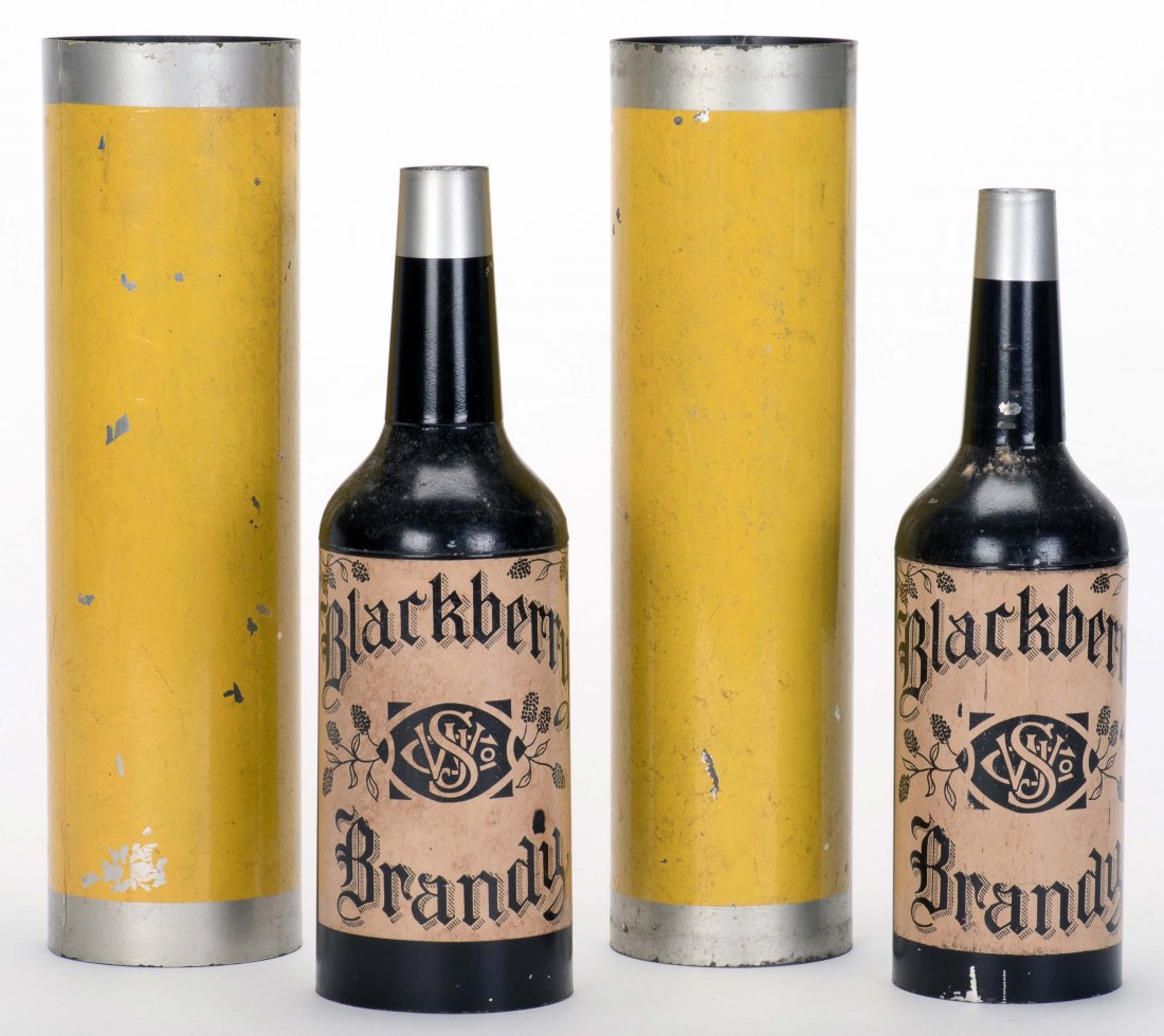 Passe Passe Bottles. New Haven: Petrie & Lewis (P&L),: Passe Passe Bottles. New Haven: Petrie & Lewis (P&L), ca. 1940. A bottle and glass magically change places underneath two separate metal tubes. Uncommon yellow paint variant, likely produced for Kante