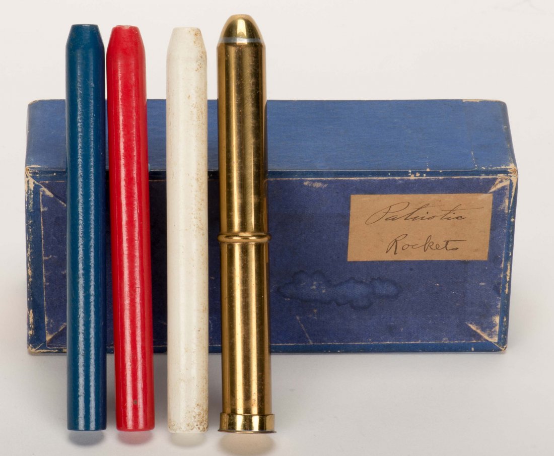 Patriotic Rockets. New Haven: Petrie & Lewis (P&L), ca.: Patriotic Rockets. New Haven: Petrie & Lewis (P&L), ca. 1940. Performer instantly knows which of the three colored wooden pegs ("rockets") is hidden in the brass tube (5 ¼" long). With box and instru
