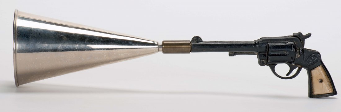 Trap Pistol Tube. Kansas City: Donald Holmes, ca. 1930.: Trap Pistol Tube. Kansas City: Donald Holmes, ca. 1930. A handkerchief, pocket watch, or rings placed in a funnel on the end of a pistol vanishes when the gun's trigger is pulled. Modified Morot cap g