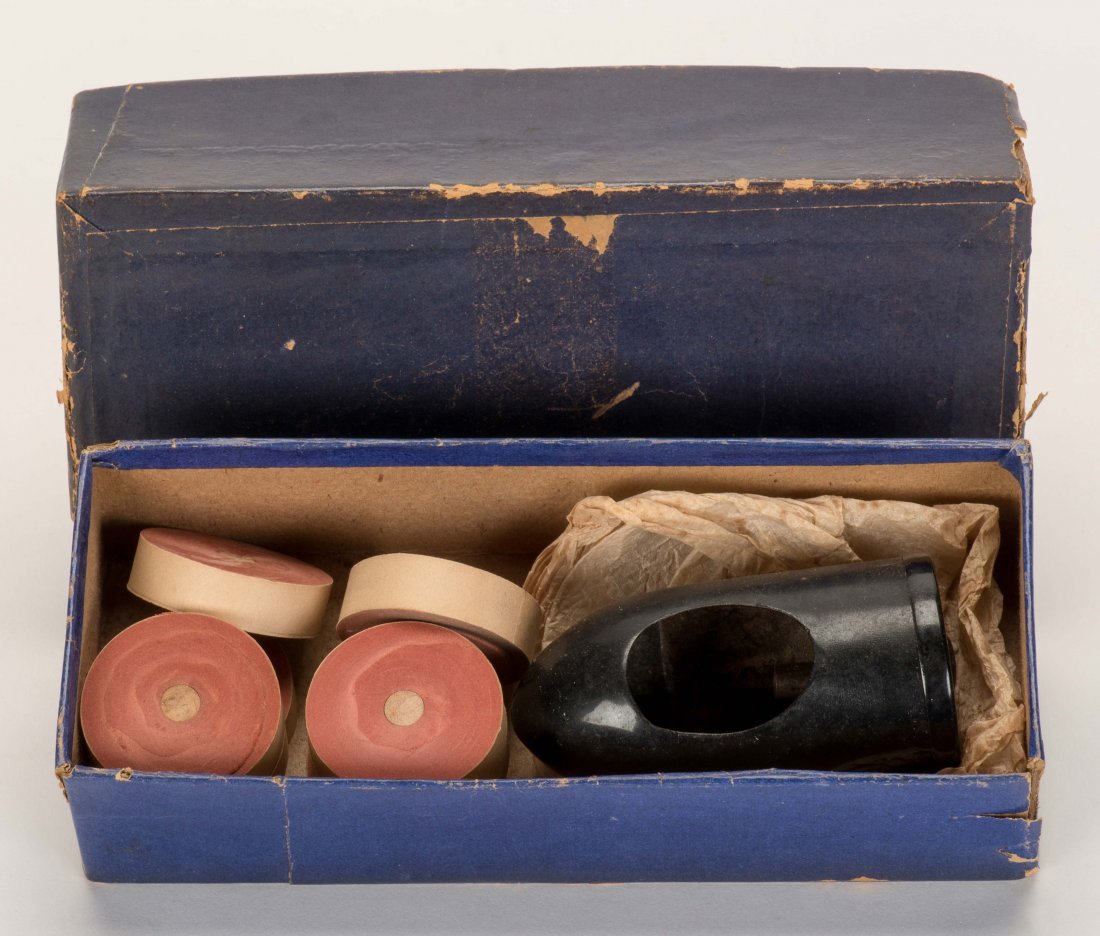 Small Coils. New Haven: Petrie & Lewis [?], ca. 1930s.: Small Coils. New Haven: Petrie & Lewis [?], ca. 1930s. Metal pull-like device used for the production of miniature Hat Coils. With original box.